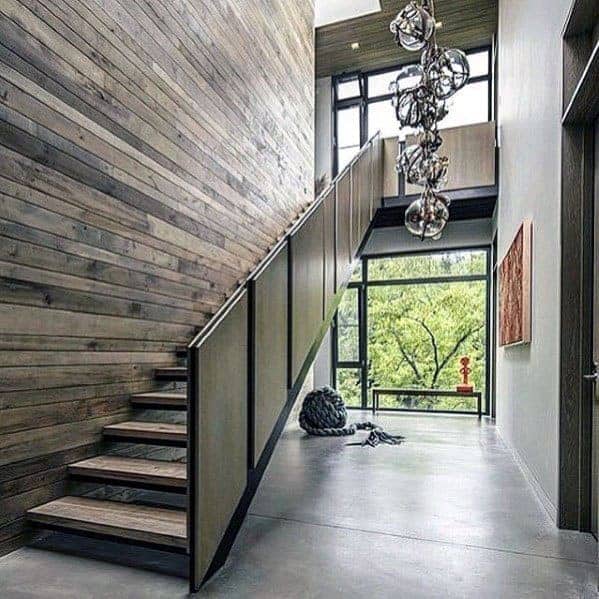 Minimalistyczne balustrady schodowe w nowoczesnym wnętrzu.
