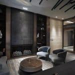 Stylowy salon z wygodnymi fotelami i nowoczesnym wykończeniem.